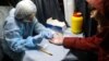 Russia -- A man has a blood test at a mobile HIV testing unit near Uralmash Station of the Yekaterinburg Metro, November 2, 2016